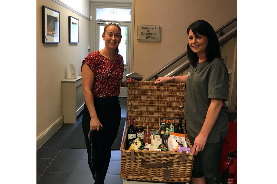 Suzanne Haveron Presenting Dr. Gribben with the winning Hamper